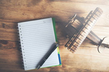 Travel concept with airplane and notepad