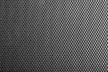 Metal grid close-up. Abstract industrial background