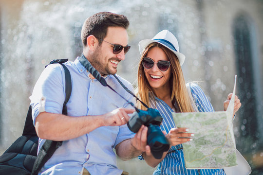 Tourist couple in love enjoying city sightseeing