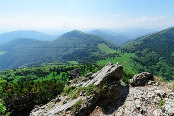 Fototapeta na wymiar The rocky slope with view on cross paths