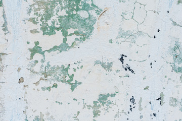 Wall fragment with scratches and cracks