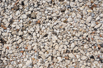 White pebble stones background texture.