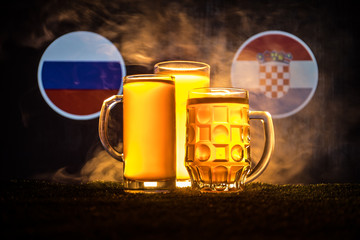 Soccer 2018. Creative concept. Beer glasses with beer on table ready to drink. Support your country with beer concept.