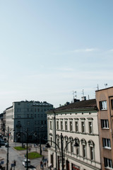 Obraz premium Street of the city of Krakow. The old Town. Public transport on the streets. Trams and buses. Polesha. City center.