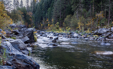 River flowing over rocks in the autumn