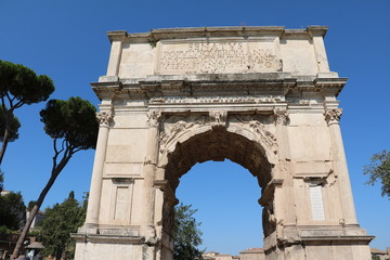Fototapeta na wymiar Arch of Titus in Forum Romanum in Rome, Italy