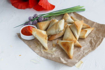 Delicious Greek filo pastry pies with potato and tuna