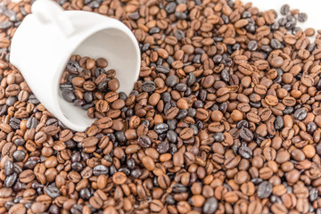 Cup of coffee. A cup of cappuccino with coffee bean as background