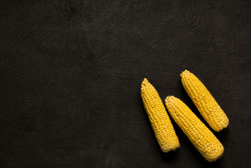 corn black stone background healthy vegetarian food © natalysavina