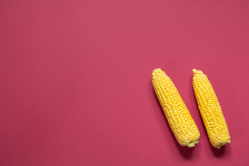corn healthy vegetarian food red background © natalysavina