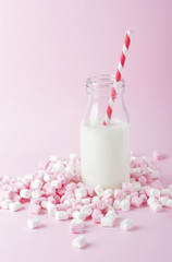 Colorful marshmallow on pink background. Copyspace.