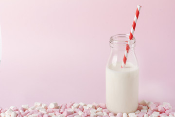 Colorful marshmallow on pink background. Copyspace.