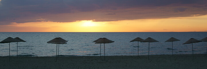 Fototapeta na wymiar Sunset at an empty beach