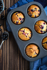 Homemade delicious muffins with fresh berries 