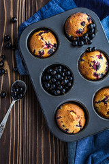Homemade delicious muffins with fresh berries 