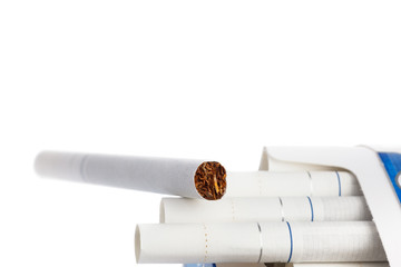 Cigarettes with white filter in a pack, isolated on white background. Close-up.