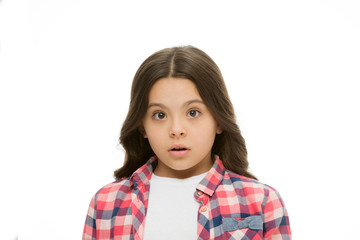 What is going on. Kid stunned bewildered emotion can not believe her eyes. Girl curly hairstyle wondering. Child bewildered confused face isolated white background. Kid girl long curly hair stunned