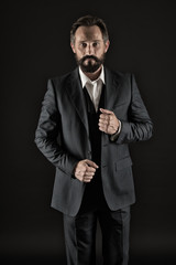 Feeling confident in his style. Businessman classic formal suit hold hand on jacket. Business people choose formal clothing. Secret tips become successful businessman entrepreneur even in mature age