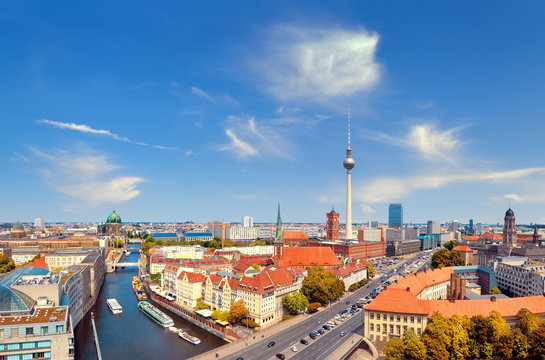 Aerial view of central Berlin on a bright day, including river Spree and television tower at Alexanderplatz