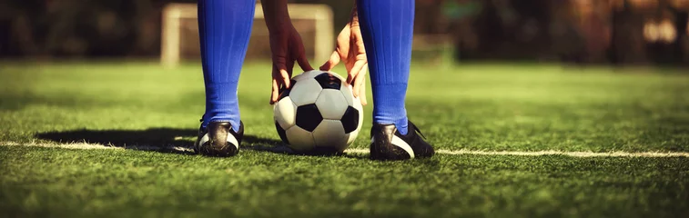 Cercles muraux Foot ballon sur le terrain de foot