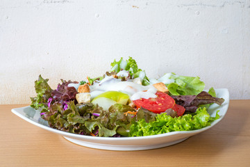 Fresh mixed vegetables salad, Salad dressing.