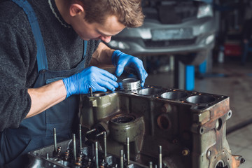 Master collects a rebuilt motor for the car..