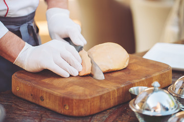 Goose liver on a wooden Board in the restaurant before cooking.