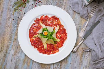 Beef carpaccio with Parmesan and arugula