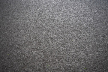 Fototapeta premium The surface of the water under the raindrops.