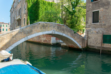 bridge across a narrow channel in venice