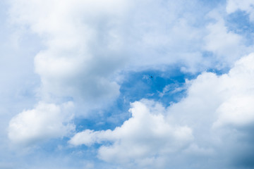 Fantastic soft white clouds against blue sky