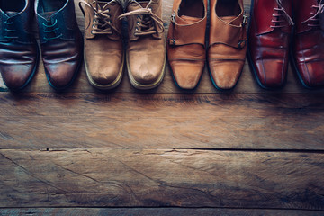 shoes for men various styles on a wooden floor - lifestyles.