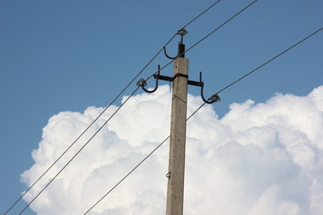 electrical wires on a background of clouds