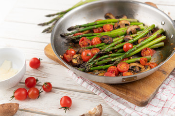 Asparagus Cooked with Cherry Tomatoes and Mushrooms