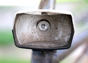 old rusty and dusty bike lamp