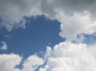 background with white clouds and blue sky