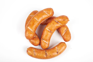 Grilled sausages isolated on a white background