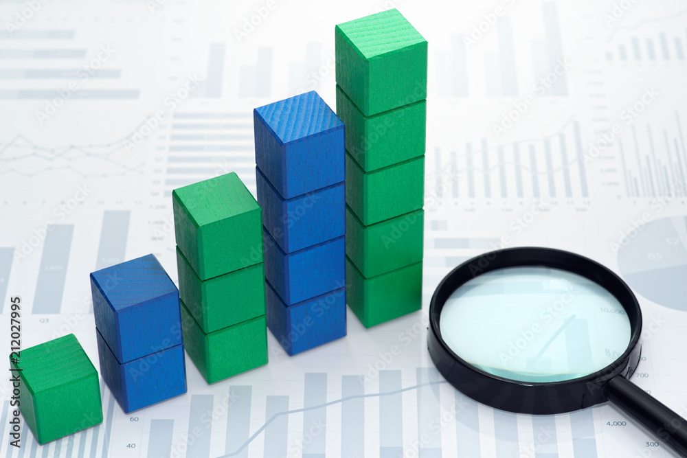 Poster Statistical data analysis. Business data processing. Toy block steps on many charts and graphs background.
