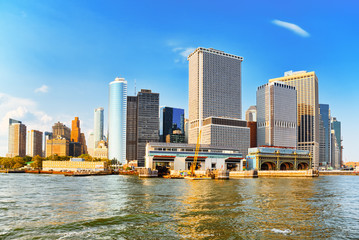 Fototapeta na wymiar View Hudson bay to Lower Manhattan and Staten Island Ferry terminal. New York City is Financial capital of America.