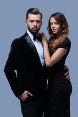 Business partners standing on a gray background