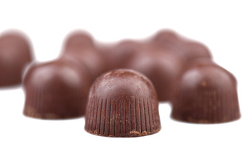 Sweet chocolates isolated on white background