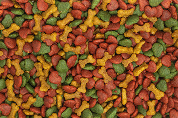 dry dog food , meat snack biscuits background .