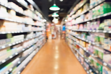 supermarket aisle and product shelves abstract blur defocused background