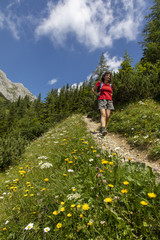 woman hiking on mountain range hochschwab, styria,austria,