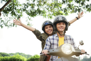 Couple on scooter © DragonImages