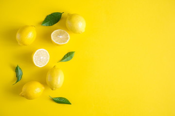 Yellow background. Lemon fruit. Flat lay, top view, copy space 