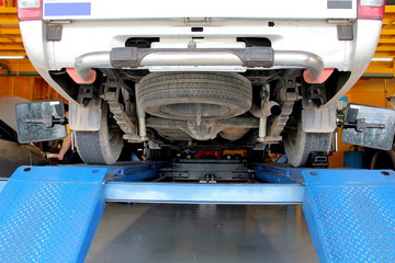 Fototapeta Pickup truck suspension and Tires,Car lower portion, understructure or undercarriage obraz