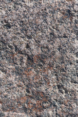 a fragment of a small area granite tiles as a background