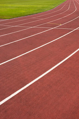 Red running track in stadium