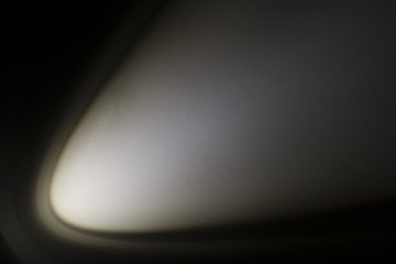 White spotlight on black background
